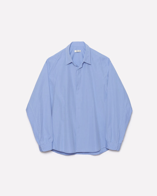 A light blue long-sleeve button-up shirt with a classic collar, laid flat against a clean, off-white background.